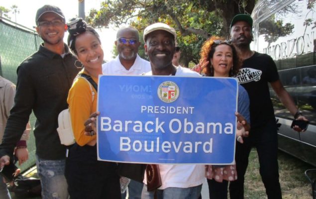 Cover photo- Obama Boulevard Sign. Inside photo- Charles Reese and Friends. Both photos by Kim Webster. 