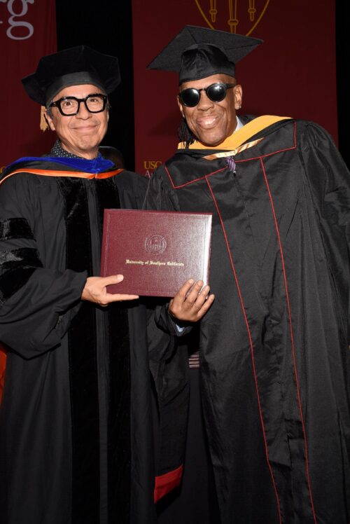 Cover photo: Buddy Sampson. Inside photo" Buddy Sampson receives his mock degree at the University of Southern California. He received at M.S. in Digitial Media Management at the University of Southern California's Annenberg School of Communication and Journalism. 