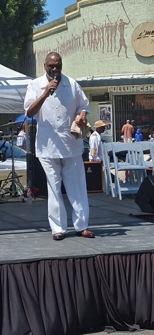 An artist performs for the Juneteenth event. 