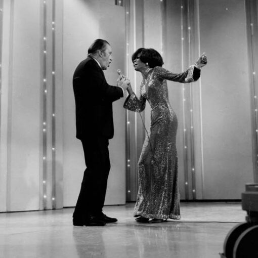 Ed Sullivan with Diana Ross. She managed to get Ed Sullivan to sing. 
