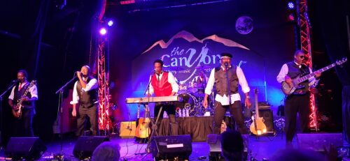 Cover: Brian O' Neal of The BusBoys. Inside Photo: The BusBoys. 