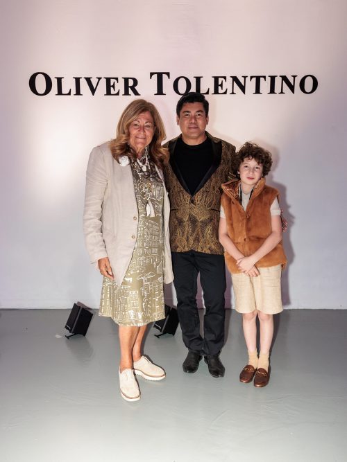 Cover photo- One of Oliver Tolentino's elegant designs. Inside photo- Founder of NYFW & Former Executive Director of CFDA (Council of Fashion Designers of America) Fern Mallis, Oliver Tolentino, & celebrity 10-year-old designer Max Alexander. 